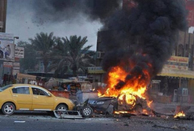 Iraq truck bomb kills 100 people at petrol station UPDATED
