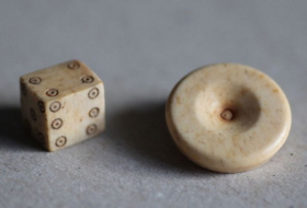 Board game pieces found in settlement built on Roman military fort