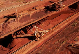 BHP hits record iron ore output amid price surge