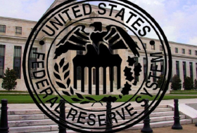 Fed holds interest rates steady, remains upbeat on economy