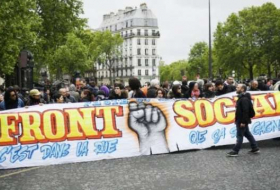 Unions, students march in Paris the day after Macron victory