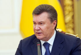 Ukrainian parliament passes law depriving Yanukovych of president