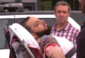 NY bomb suspect `held after shooting`