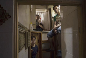 'Coffin homes' of Hong Kong revealed in pictures