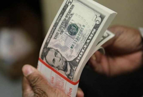 Dollar slips on fears over U.S. tax reform