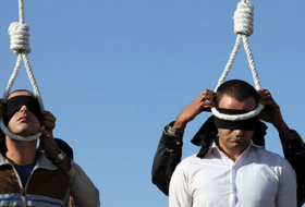 Iran publicly hangs drug smuggler & police killer