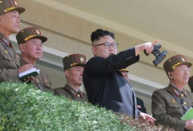 North Korea’s Kim celebrates test of ‘perfect weapon system’