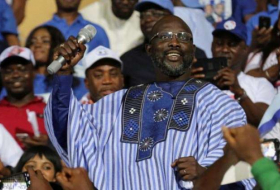 Ex-soccer star 'King George' Weah wins Liberia's presidency