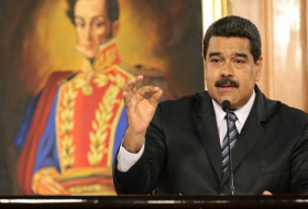 Venezuelan President Nicolas Maduro signs order calling constituent assembly