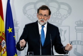 Spanish PM defends handling of Catalan crisis after election blow