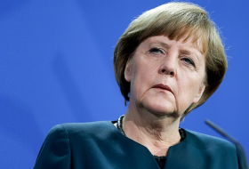 Germany`s Merkel urges Japan to confront wartime past