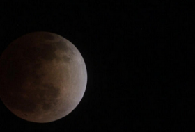 Shortest lunar eclipse of the century: How to see it this weekend - VIDEO 