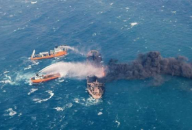 China: oil slick from sunken tanker trebles in size