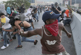 Some 40 people injured in protests in Caracas prompted by Maduro's initiative