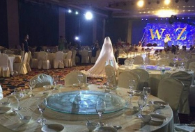 Chinese couple goes ahead with wedding despite freak storm that kept guests away