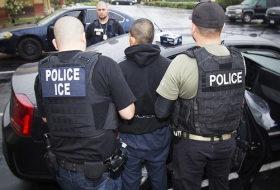 Hundreds of immigrants arrested in `routine` U.S. enforcement surge