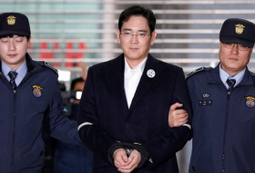 Samsung Group chief denies all charges as 'trial of the century' begins