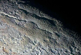 `Snakeskin` Photos Reveal Pluto in Dazzling Details