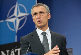 NATO chief urges West to keep pressuring Russia over Ukraine