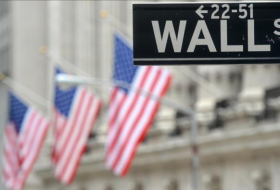 Wall Street closes lower but indexes end month higher